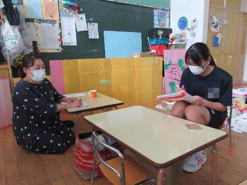 六十に